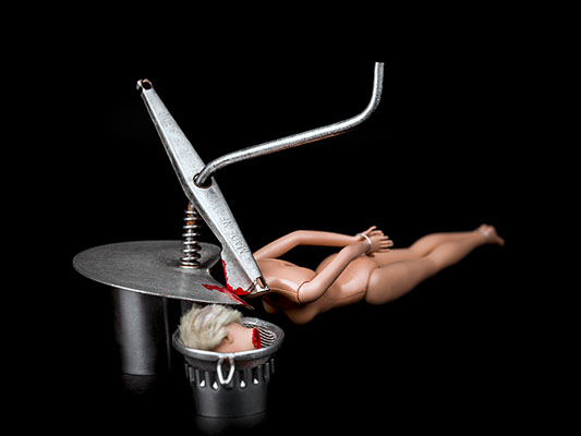 picture of decapitated Barbie shot in studio Halet with a Mamiya medium format digital back Phase One